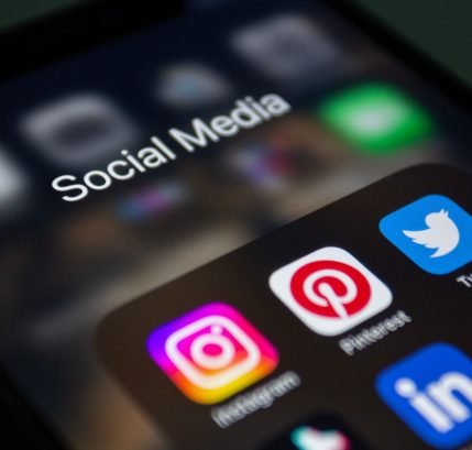 A smartphone screen displaying popular social media applications like Instagram and Twitter.